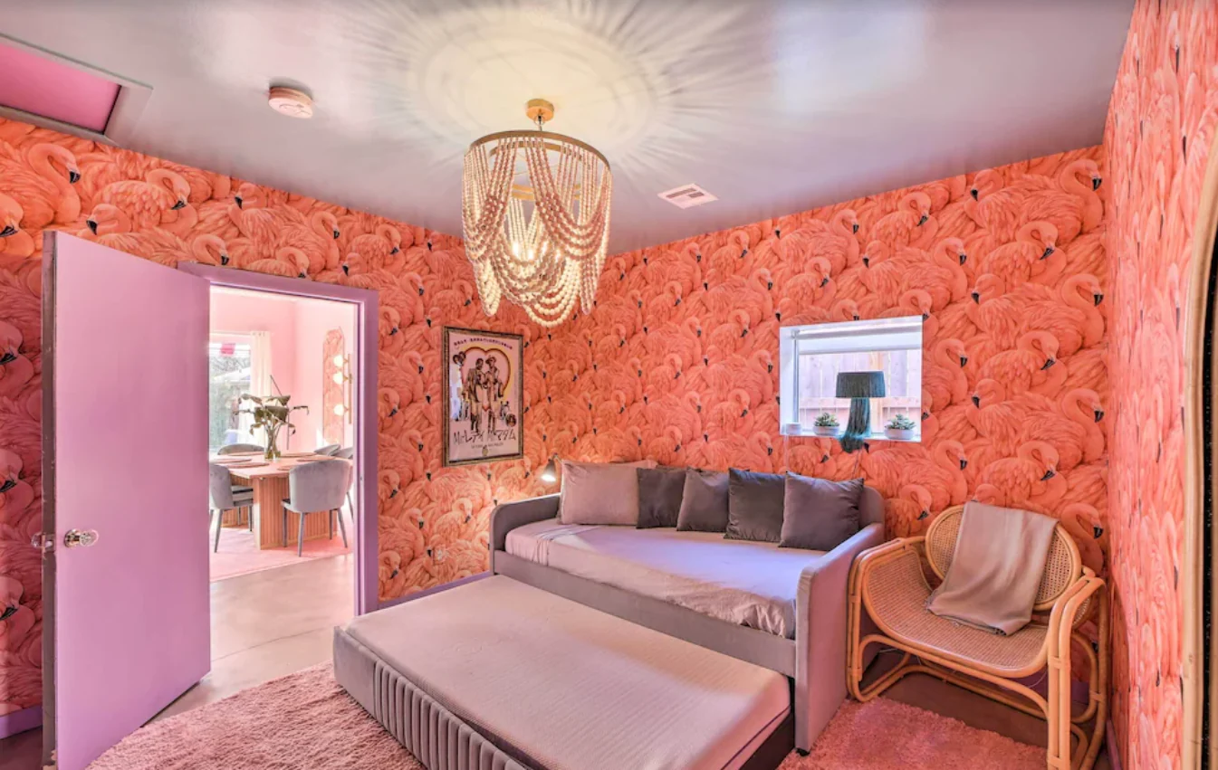 Guest bedroom with orange botanical wallpaper and a daybed — Tulsa Birdcage, Tulsa, Oklahoma