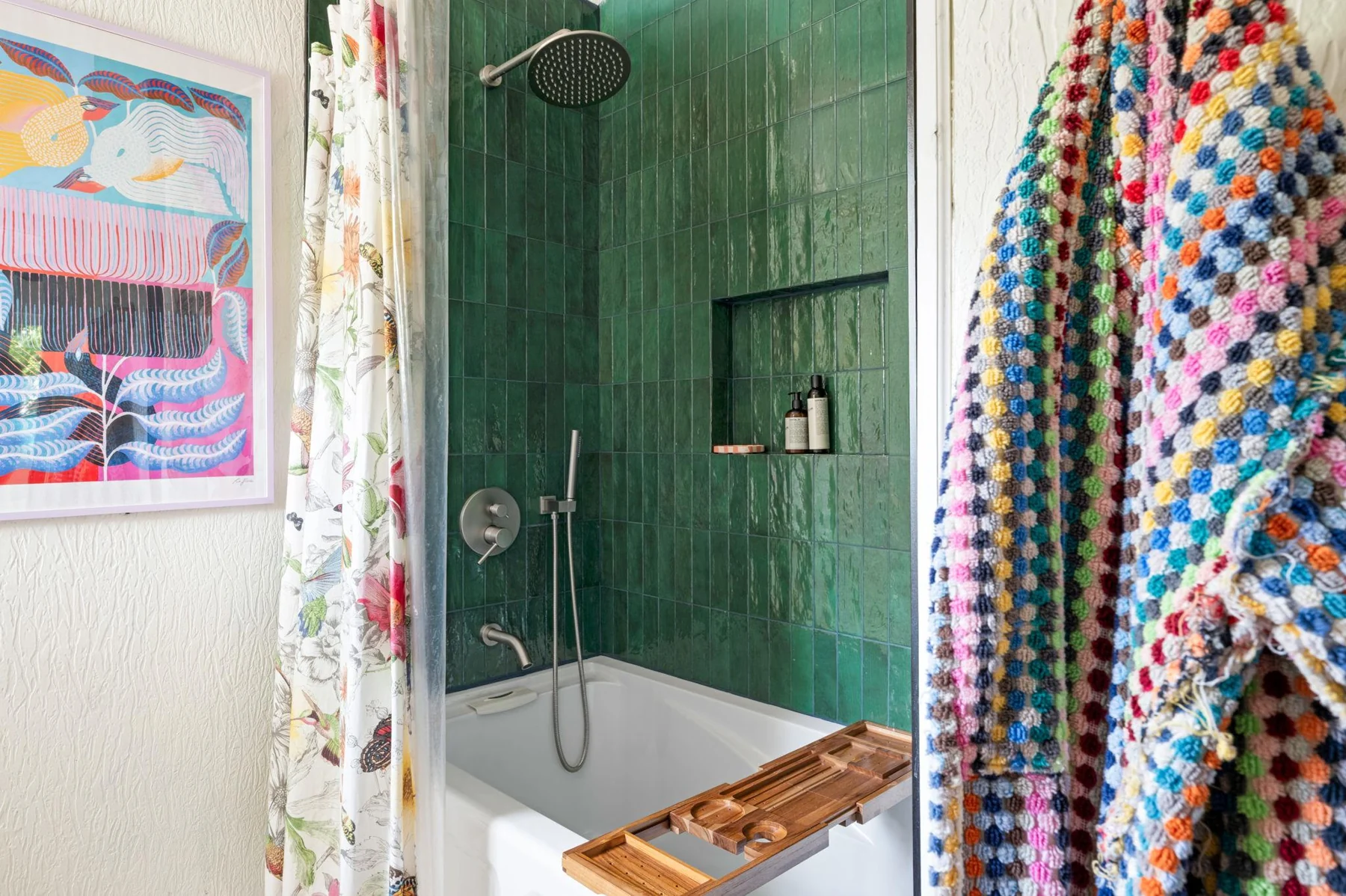 Bathroom with green shower tile and a colorful curtain — Woodhue, South Austin, Texas